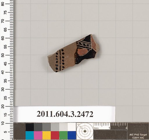 Terracotta fragment of a kylix (drinking cup)