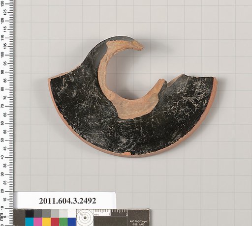 Terracotta fragment of a kylix (drinking cup)