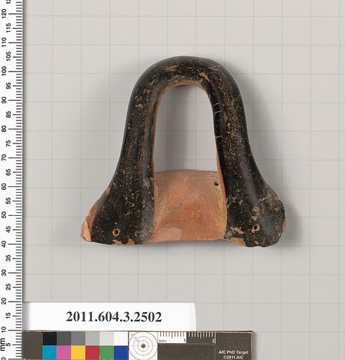Terracotta fragment of a kylix (drinking cup)