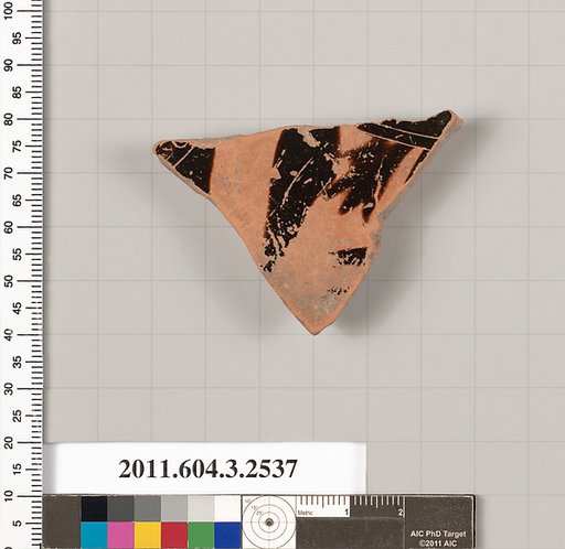 Terracotta fragment of a kylix (drinking cup)
