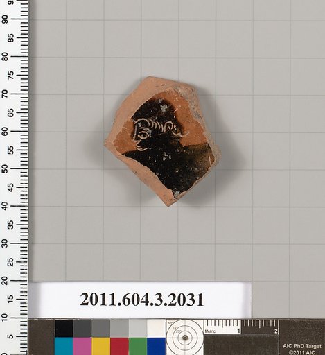Terracotta fragment of a kylix (drinking cup)