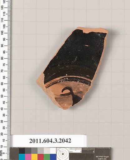 Terracotta fragment of a kylix (drinking cup)