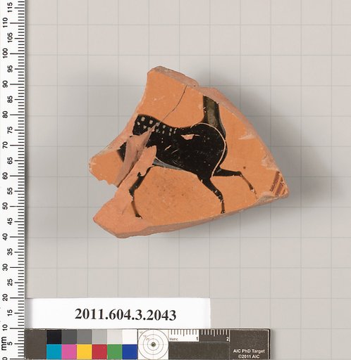 Terracotta fragment of a kylix (drinking cup)