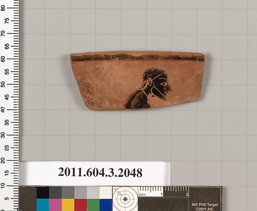 Terracotta rim fragment of a kylix (drinking cup)