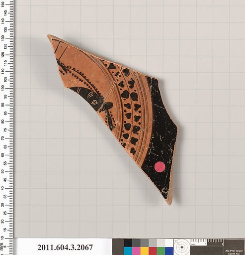 Terracotta fragment of a kylix (drinking cup)