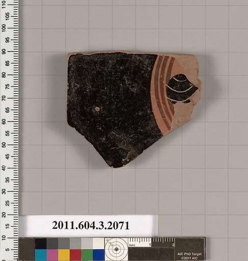 Terracotta fragment of a kylix (drinking cup)