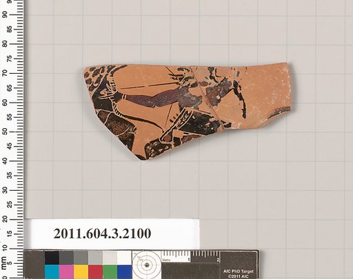 Terracotta fragment of a kylix (drinking cup)