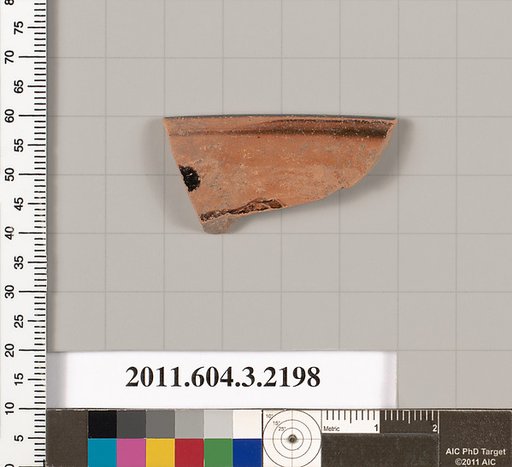 Terracotta rim fragment of a kylix (drinking cup)