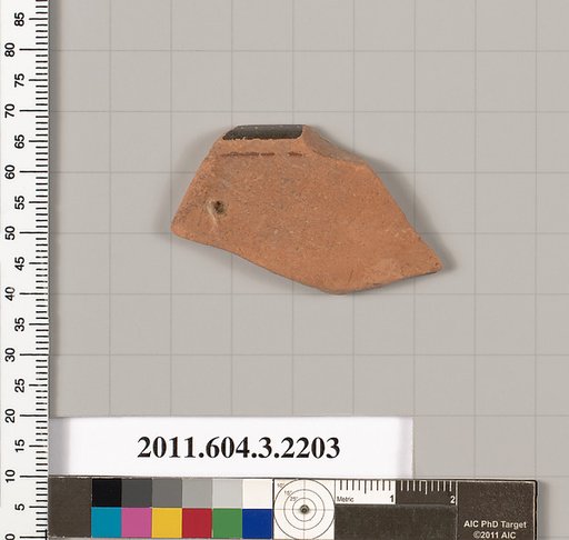 Terracotta rim fragment of a kylix (drinking cup)