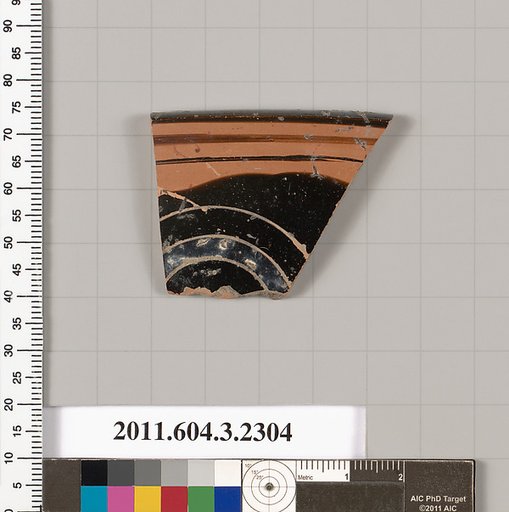 Terracotta rim fragment of a kylix: eye-cup (drinking cup)