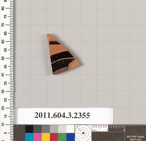 Terracotta fragment of a kylix: eye-cup (drinking cup)