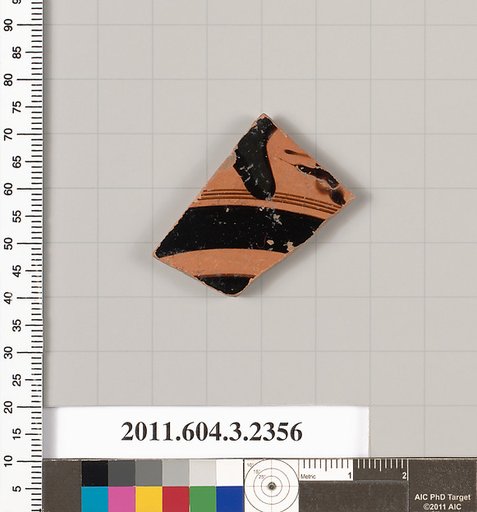 Terracotta fragment of a kylix: eye-cup (drinking cup)