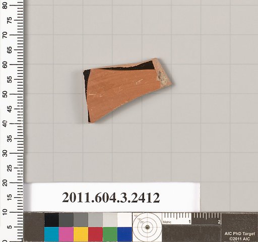 Terracotta fragment of a kylix: eye-cup (drinking cup)