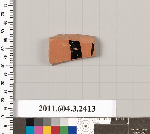 Terracotta fragment of a kylix: eye-cup (drinking cup)