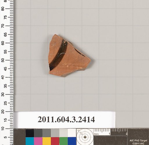 Terracotta fragment of a kylix: eye-cup (drinking cup)