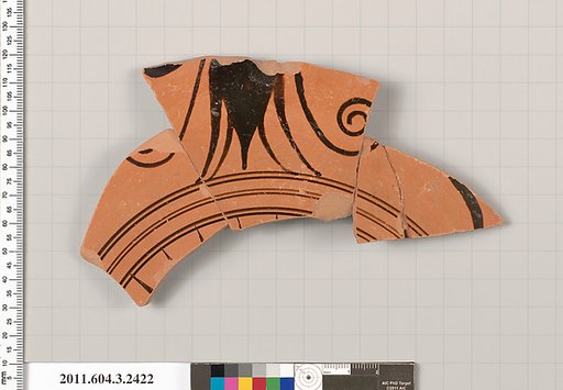Terracotta fragment of a kylix: eye-cup (drinking cup)