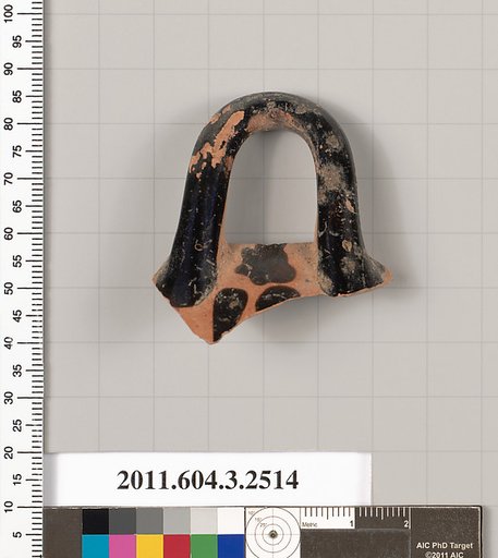 Terracotta fragment of a kylix (drinking cup)