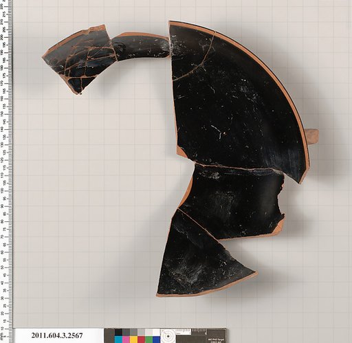 Terracotta fragment of a kylix: eye-cup (drinking cup)