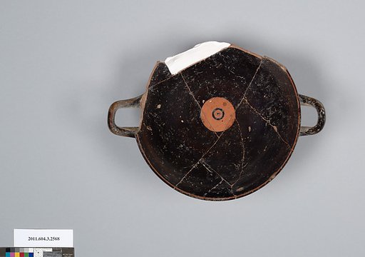 Terracotta fragment of a kylix: eye-cup (drinking cup)