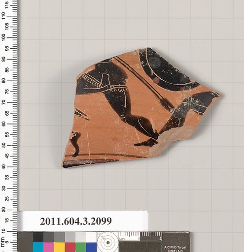 Terracotta fragment of a kylix (drinking cup)