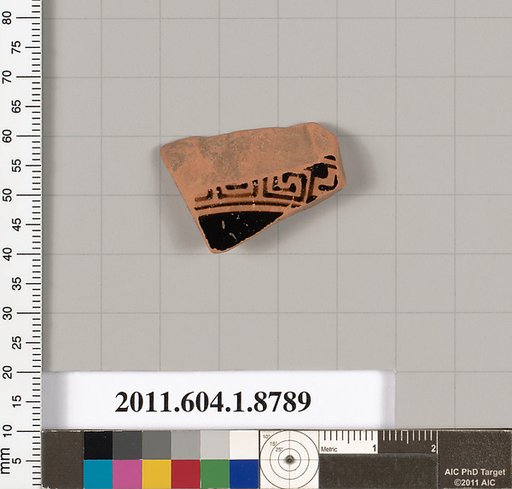 Terracotta fragment of a kylix (drinking cup)
