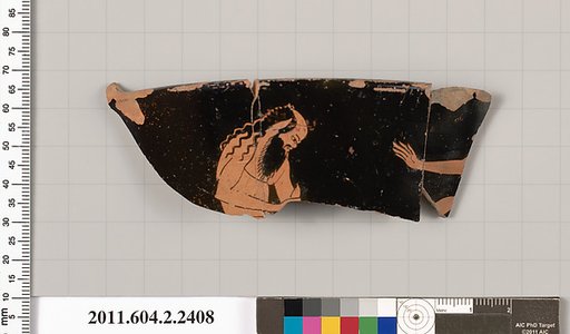 Terracotta fragment of a head kantharos (drinking cup with high handles)?