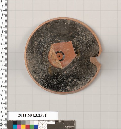 Terracotta fragment of a kylix (drinking cup)