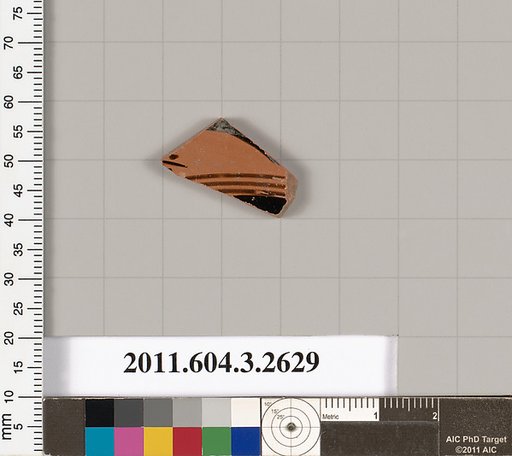 Terracotta fragment of a kylix: eye-cup (drinking cup)