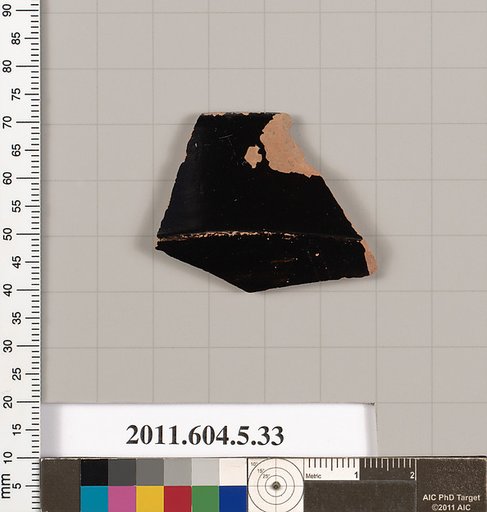 Terracotta rim fragment of a kylix (drinking cup)