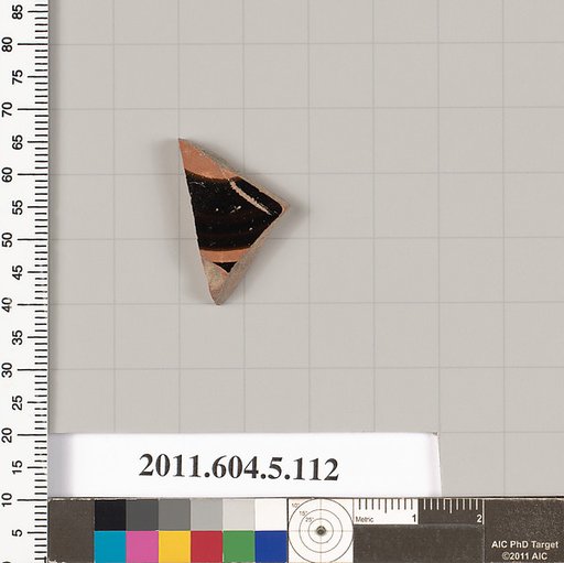 Terracotta fragment of a stemless kylix (drinking cup)