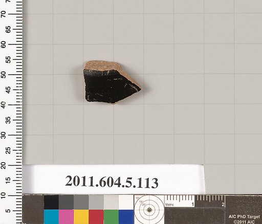 Terracotta fragment of a stemless kylix (drinking cup)?