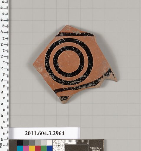 Terracotta fragment of a kylix: eye-cup (drinking cup)