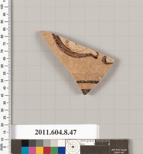 Terracotta fragment of a kylix: eye cup (drinking cup)
