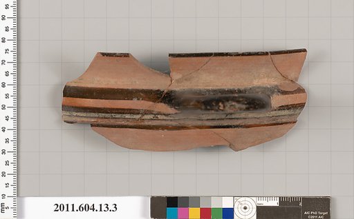 Terracotta fragment of a kylix (drinking cup)