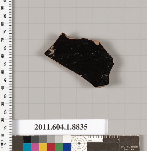 Terracotta fragment of a kylix (drinking cup)