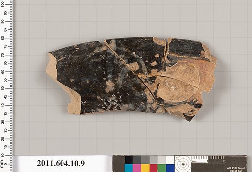 Terracotta fragment of a kylix (drinking cup)