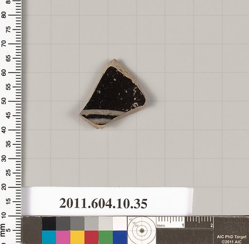 Terracotta fragment of a kylix (drinking cup)
