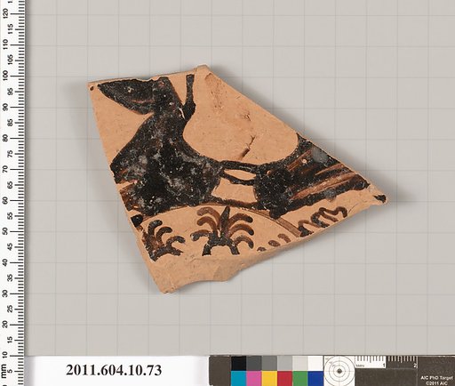 Terracotta fragment of a kylix (drinking cup)