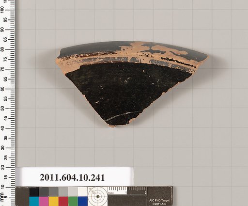 Terracotta fragment of a "fish plate"?