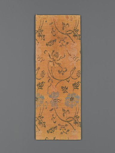 Sutra cover with boys holding the stems of large flowers