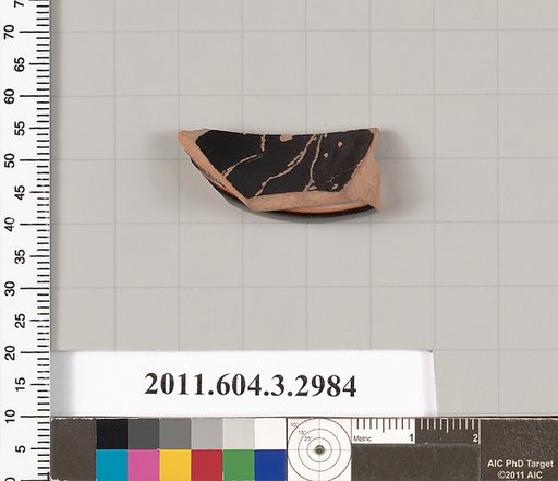 Terracotta fragment of a stemless kylix (drinking cup)