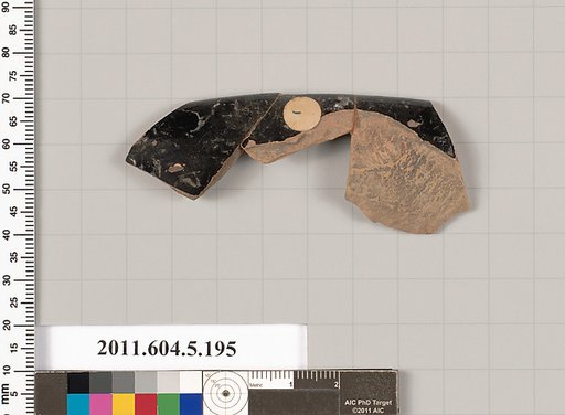 Terracotta rim fragment of a kylix (drinking cup)