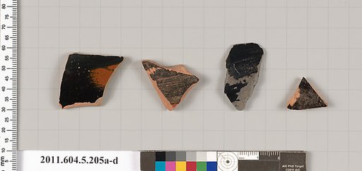 Terracotta fragments of kylikes (drinking cups)