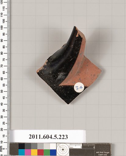 Terracotta fragment of a kylix (drinking cup)