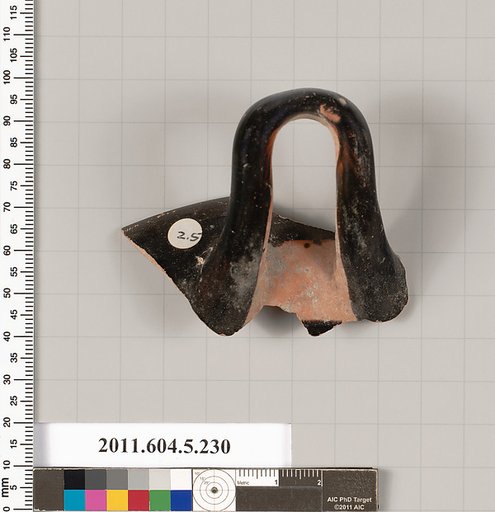 Terracotta rim fragment of a kylix (drinking cup)