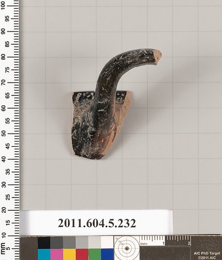 Terracotta rim fragment of a kylix (drinking cup)