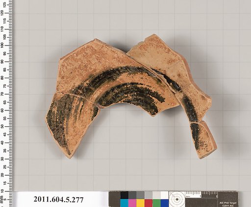 Terracotta fragment of a kylix (drinking cup)