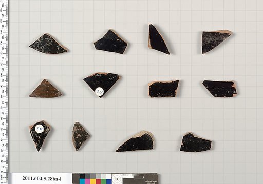 Terracotta fragments of kylikes (drinking cups)