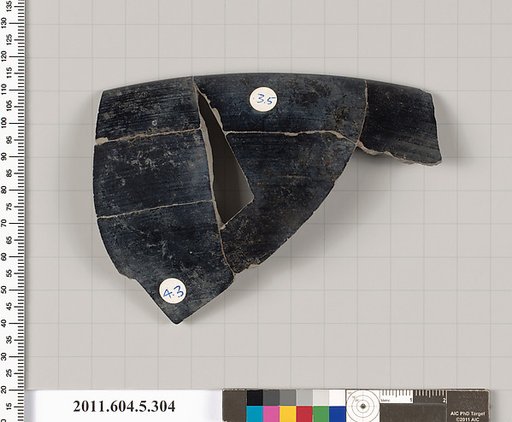 Terracotta rim fragment of a kylix (drinking cup)