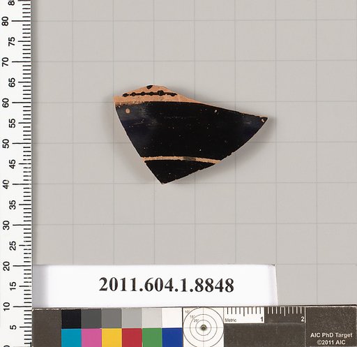 Terracotta fragment of a stemless kylix (drinking cup)?